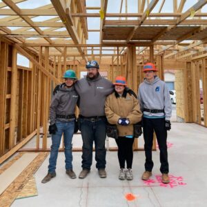 Habitat for Humanity volunteers inside a new home build